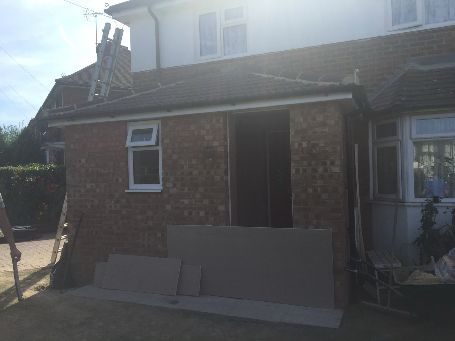 Roof structure installation on porch extension Stafford